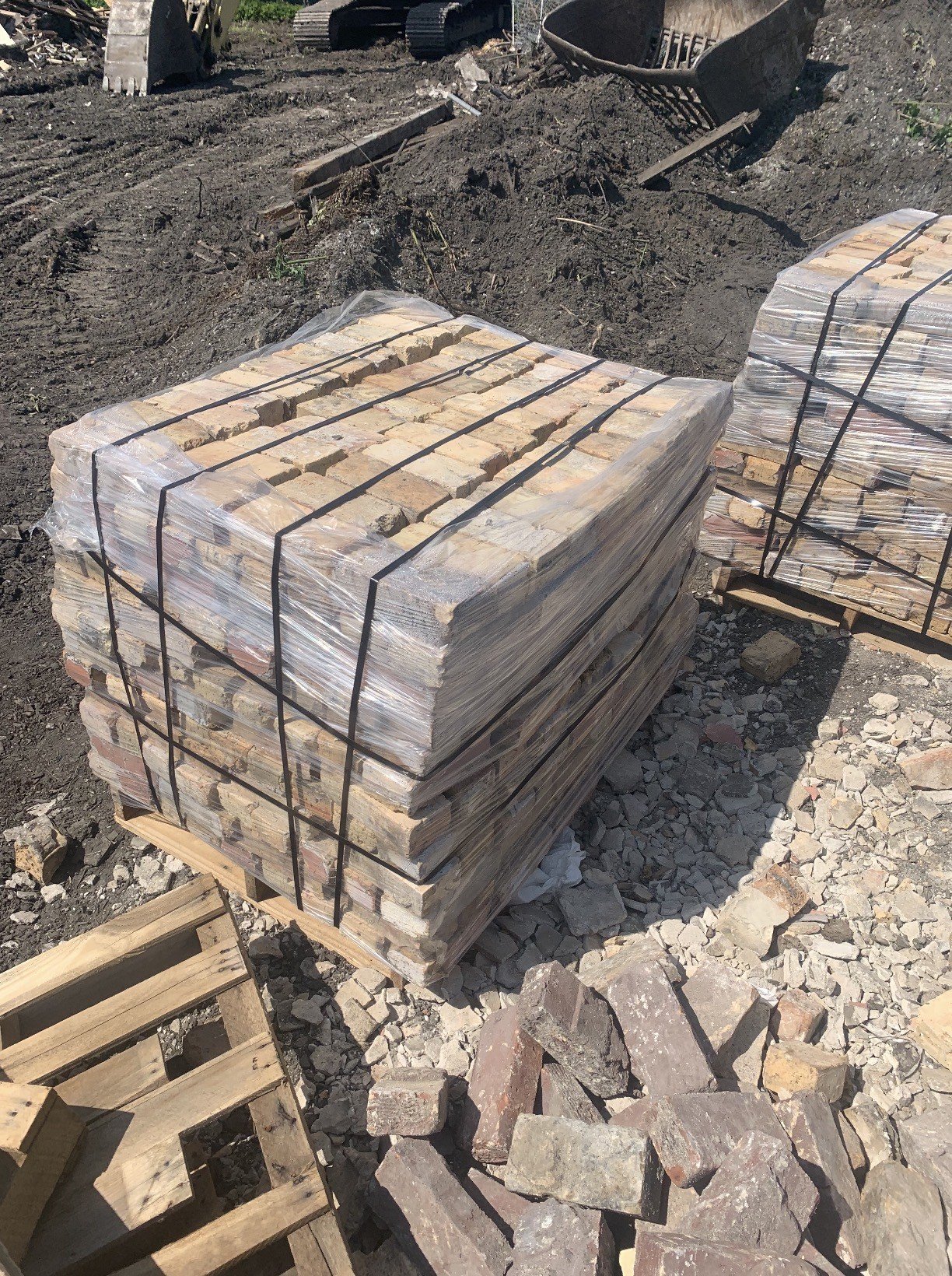 Pallets of reclaimed brick prepared for reuse