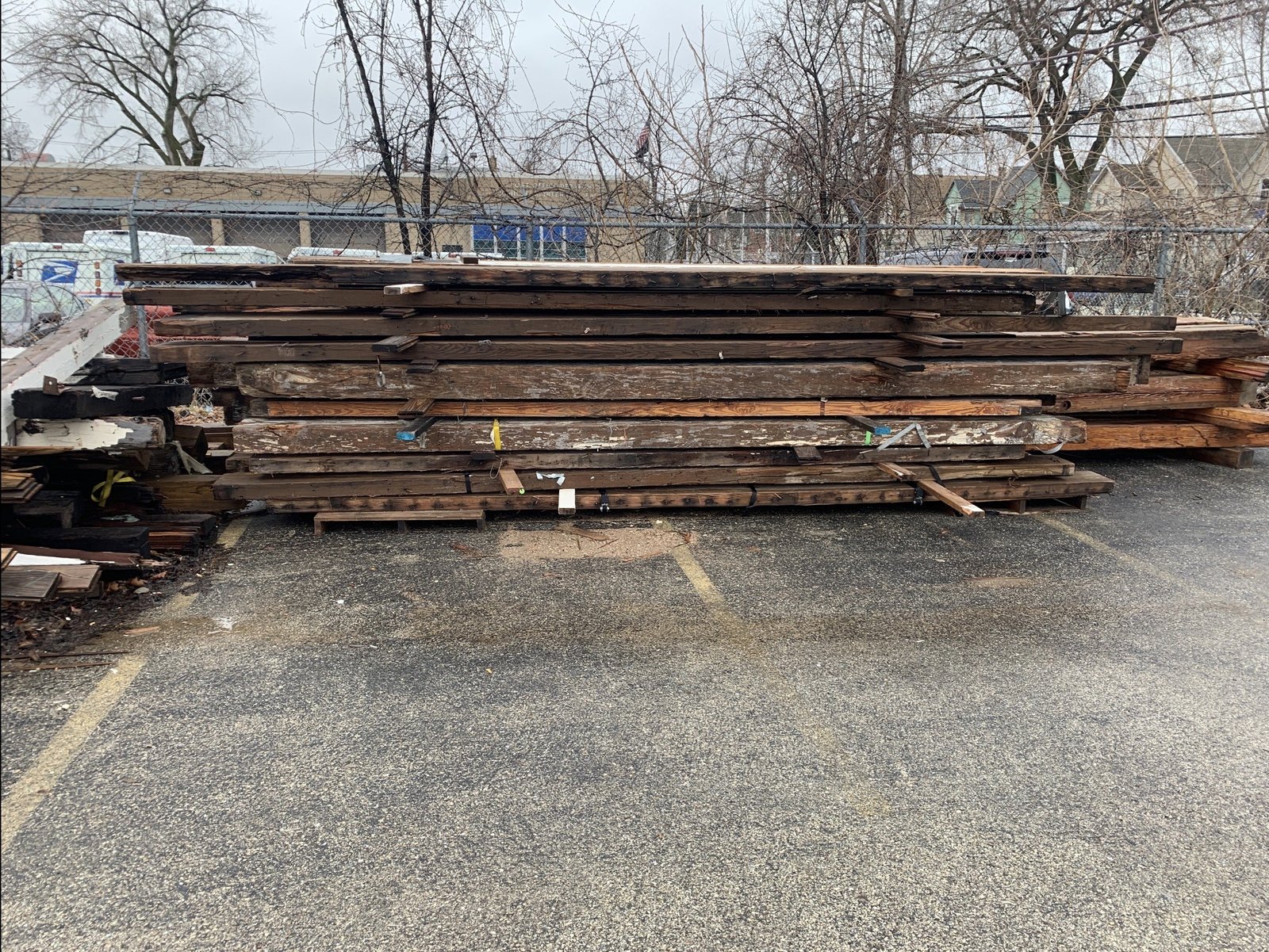 Stacked reclaimed lumber